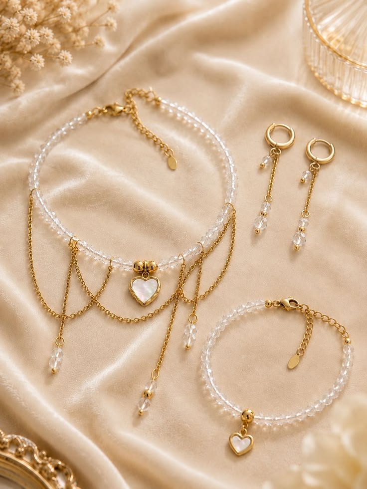 Beautiful handmade jewelry collection with necklace, bracelet, earrings, and ring